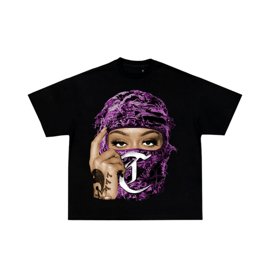 Black t-shirt with a graphic of a person wearing a purple headscarf and showing a peace sign with a logo on a white background.