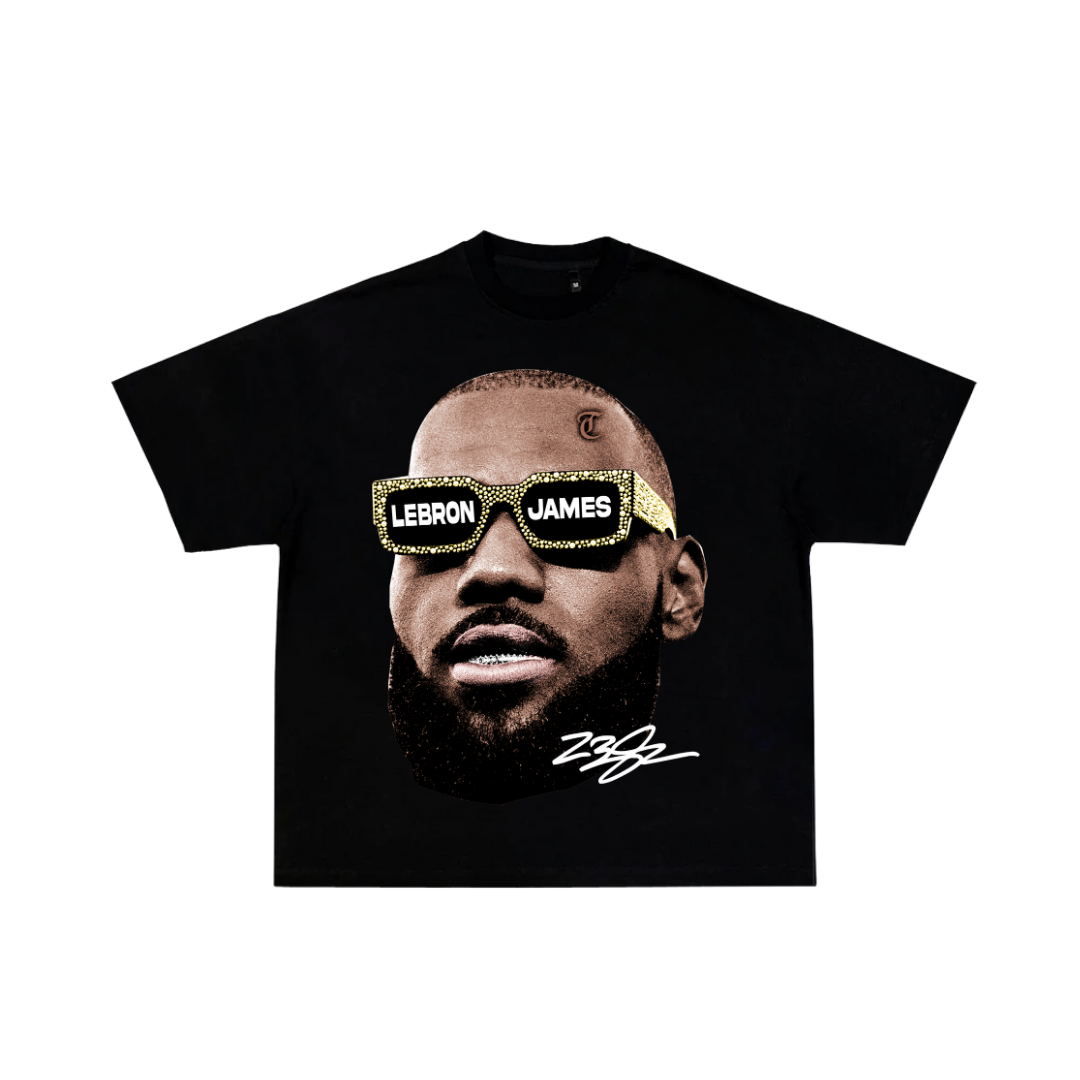 Black t-shirt with a graphic of a person wearing sunglasses with 'LeBron James' text, on a white background.