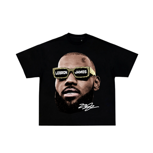 Black t-shirt with a graphic of a person wearing sunglasses with 'LeBron James' text, on a white background.