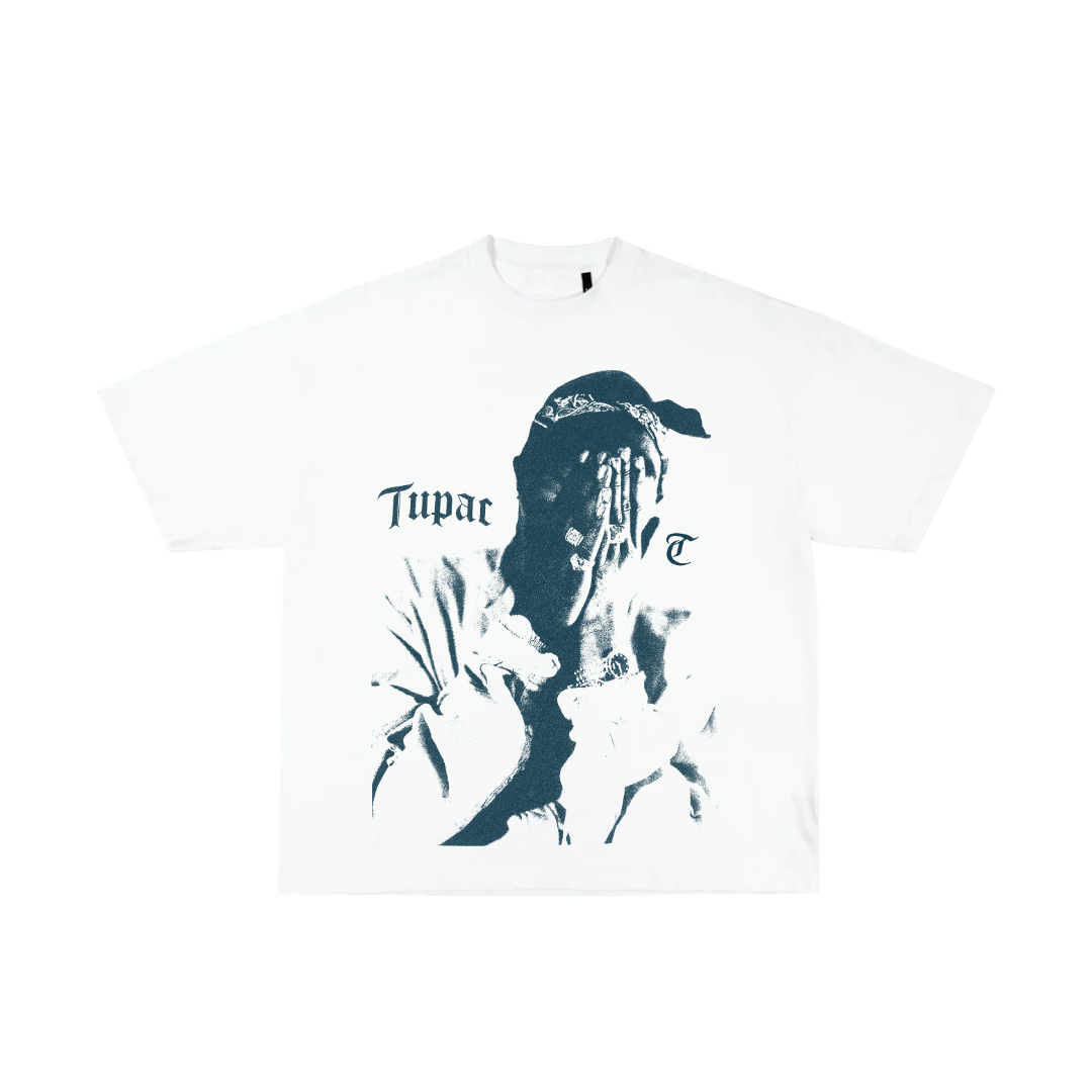 White t-shirt with a graphic design of a person and 'Tupac' text on a white background