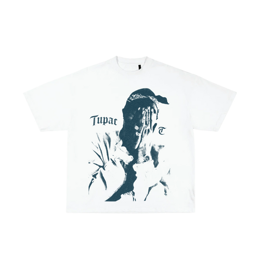 White t-shirt with a graphic design of a person and 'Tupac' text on a white background